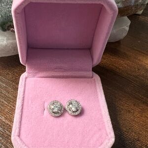 Brand new. Sterling Silver Moissanite stud earrings.
